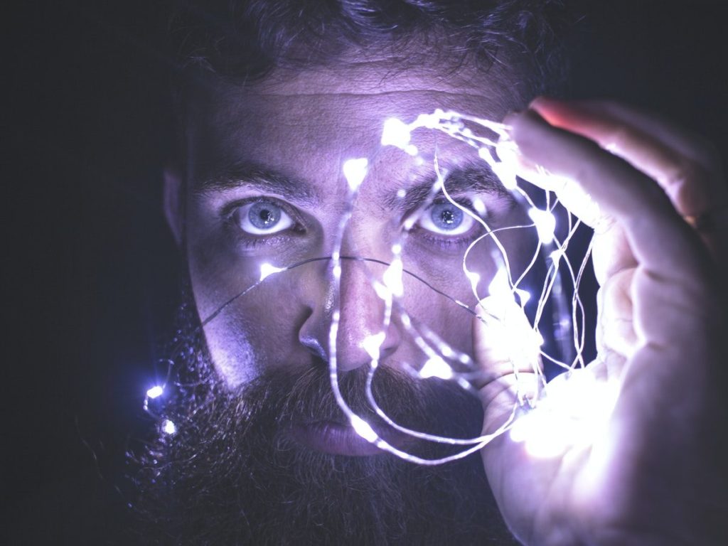 Person Holding String Lights Photo