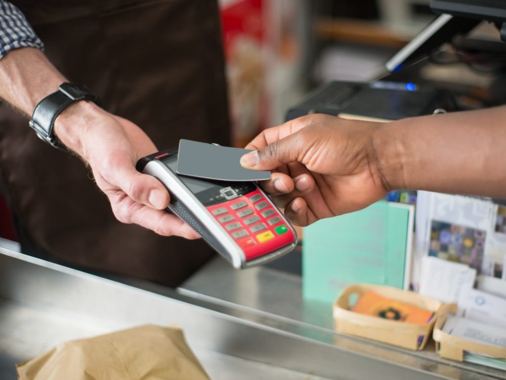Person Paying Using a Bank Card