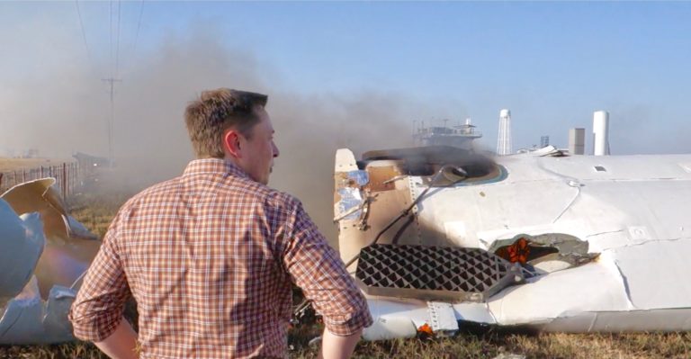 Elon Musk overlooking the remains of FR  scaled e