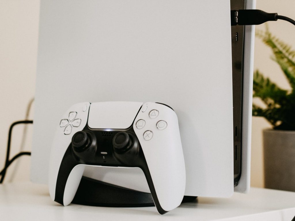 white and black xbox one game controller