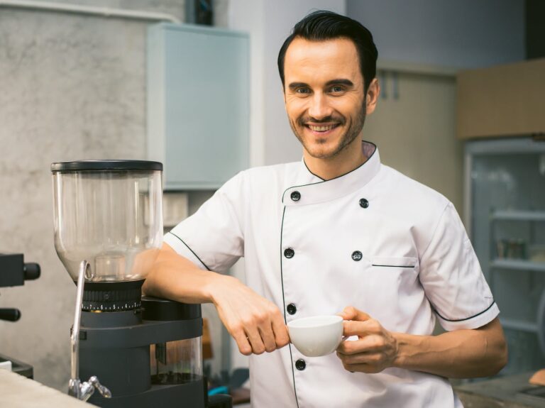 Chef Holding White Tea Cup