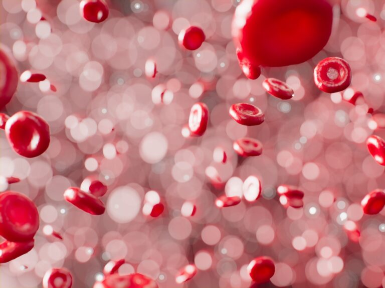 a bunch of red bubbles floating in the air
